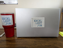 Load image into Gallery viewer, Picture of a desk with a yeti cup and laptop. the cup and laptop each have a sticker that says "Excel-lent Job".