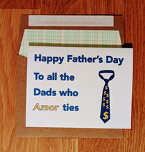 Load image into Gallery viewer, Accounting themed greeting card atop a ledger paper lined envelope.  The card reads "Happy Father's Day to all the dads who Amor ties" and has a picture of a necktie.