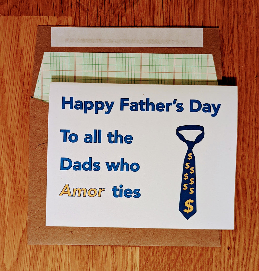 Accounting themed greeting card atop a ledger paper lined envelope.  The card reads 